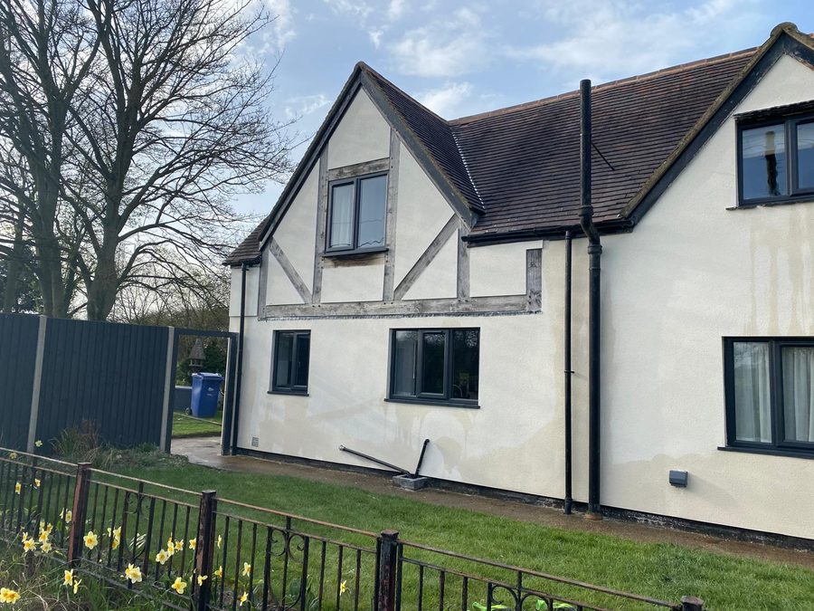 Detached house rendered by Express Plastering in a smooth cream finish